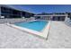 Community pool with plenty of lounge chairs at 6033 34Th W St # 138, Bradenton, FL 34210