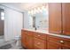 Clean bathroom, featuring light wood cabinets and a shower/tub combo at 6300 Midnight Pass Rd # 708, Sarasota, FL 34242
