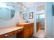 Double vanity bathroom with updated fixtures and a large shower at 6300 Midnight Pass Rd # 708, Sarasota, FL 34242