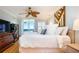 King-size bed, ocean view, ceiling fan at 6300 Midnight Pass Rd # 708, Sarasota, FL 34242