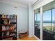 Bedroom with bookcase and ocean view at 6300 Midnight Pass Rd # 708, Sarasota, FL 34242