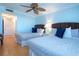 Guest bedroom with two beds and access to hallway at 6300 Midnight Pass Rd # 708, Sarasota, FL 34242