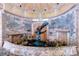 Circular fountain with dolphin and sea turtle sculptures at 6300 Midnight Pass Rd # 708, Sarasota, FL 34242
