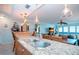Kitchen with granite counters, island, ocean view at 6300 Midnight Pass Rd # 708, Sarasota, FL 34242