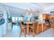 Kitchen with granite countertop and breakfast bar at 6300 Midnight Pass Rd # 708, Sarasota, FL 34242