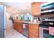 Bright kitchen with granite countertops and stainless steel appliances at 6300 Midnight Pass Rd # 708, Sarasota, FL 34242