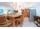Modern kitchen with granite countertop and stainless steel appliances at 6300 Midnight Pass Rd # 708, Sarasota, FL 34242