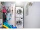 Stackable LG washer and dryer in a dedicated laundry closet at 6300 Midnight Pass Rd # 708, Sarasota, FL 34242