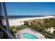 Stunning view of beach, pool, and ocean from condo at 6300 Midnight Pass Rd # 708, Sarasota, FL 34242