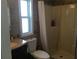 Clean bathroom with shower, toilet and vanity at 763 Lakeside Dr, North Port, FL 34287
