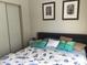 Bedroom with seashell bedding and a calming atmosphere at 763 Lakeside Dr, North Port, FL 34287