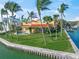 Waterfront home with tropical landscaping at 929 Casey Cove Dr, Nokomis, FL 34275