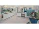 Elegant bathroom with and sinks and blue tile at 929 Casey Cove Dr, Nokomis, FL 34275