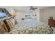Spacious Primary bedroom with water views and ample natural light at 929 Casey Cove Dr, Nokomis, FL 34275