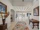 Bright and spacious entryway with high ceilings and views to the kitchen and living areas at 929 Casey Cove Dr, Nokomis, FL 34275