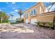 Two-story waterfront home with double garage and paver driveway at 929 Casey Cove Dr, Nokomis, FL 34275