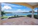 Relaxing patio overlooking the water with stunning views at 929 Casey Cove Dr, Nokomis, FL 34275