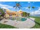 Expansive pool and spa with tranquil setting at 929 Casey Cove Dr, Nokomis, FL 34275