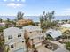 Beachfront property view with a tan house and ocean at 107 75Th St, Holmes Beach, FL 34217