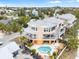 Three-story house with private pool and ocean view at 107 75Th St, Holmes Beach, FL 34217