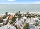 Aerial view of house and neighborhood near the beach at 107 75Th St, Holmes Beach, FL 34217
