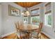Charming dining room with a wooden table and chairs at 107 75Th St, Holmes Beach, FL 34217