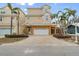 Two-story beach house with attached garage at 107 75Th St, Holmes Beach, FL 34217