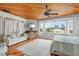 Spacious main bedroom with bay window, sitting area, and ocean views at 107 75Th St, Holmes Beach, FL 34217