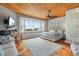 Large main bedroom with bay window, wood floors, and sitting area at 107 75Th St, Holmes Beach, FL 34217