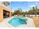 Relaxing pool and spa area with patio furniture at 107 75Th St, Holmes Beach, FL 34217