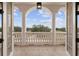 Private balcony offering scenic views of the surrounding landscape at 1450 Bern Creek Loop, Sarasota, FL 34240