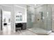 Elegant bathroom with a large shower, vanity, and view to bedroom at 1450 Bern Creek Loop, Sarasota, FL 34240
