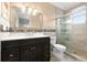 Elegant bathroom with updated vanity, shower, and toilet at 1450 Bern Creek Loop, Sarasota, FL 34240