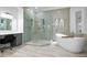 Bathroom features a large walk-in shower and freestanding tub at 1450 Bern Creek Loop, Sarasota, FL 34240