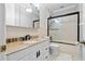 Bathroom with granite vanity and tub/shower combo at 1450 Bern Creek Loop, Sarasota, FL 34240