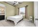 Bright bedroom with a double bed and ensuite bathroom access at 1450 Bern Creek Loop, Sarasota, FL 34240