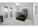 Cozy bedroom with bunk beds, built-ins and access to balcony at 1450 Bern Creek Loop, Sarasota, FL 34240