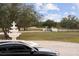 Elegant entrance with fountain and paved driveway at 1450 Bern Creek Loop, Sarasota, FL 34240