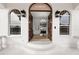 Open double doors to a spacious foyer at 1450 Bern Creek Loop, Sarasota, FL 34240
