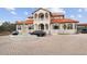 Two-story home with fountain and manicured landscaping at 1450 Bern Creek Loop, Sarasota, FL 34240