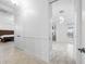 Bright hallway with access to bedroom and bathroom at 1450 Bern Creek Loop, Sarasota, FL 34240