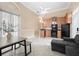 Open kitchen features modern cabinetry, appliances, and breakfast nook at 1450 Bern Creek Loop, Sarasota, FL 34240