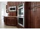 Built-in double ovens and microwave in kitchen at 1450 Bern Creek Loop, Sarasota, FL 34240