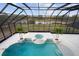 Enclosed pool and spa with expansive views at 1450 Bern Creek Loop, Sarasota, FL 34240