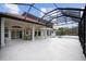 Luxury pool and patio with covered lanai, spa, and serene views at 1450 Bern Creek Loop, Sarasota, FL 34240