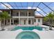 Luxury home with a large, screened pool and spa at 1450 Bern Creek Loop, Sarasota, FL 34240