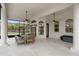 Spacious screened patio with outdoor dining furniture at 1450 Bern Creek Loop, Sarasota, FL 34240