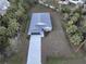 One story home with paver driveway, and surrounding trees at 1463 Jinright Rd, North Port, FL 34288