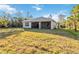 House with large backyard, screened patio at 1463 Jinright Rd, North Port, FL 34288