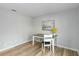 Simple home office with wood flooring, gray walls and a desk at 1463 Jinright Rd, North Port, FL 34288
